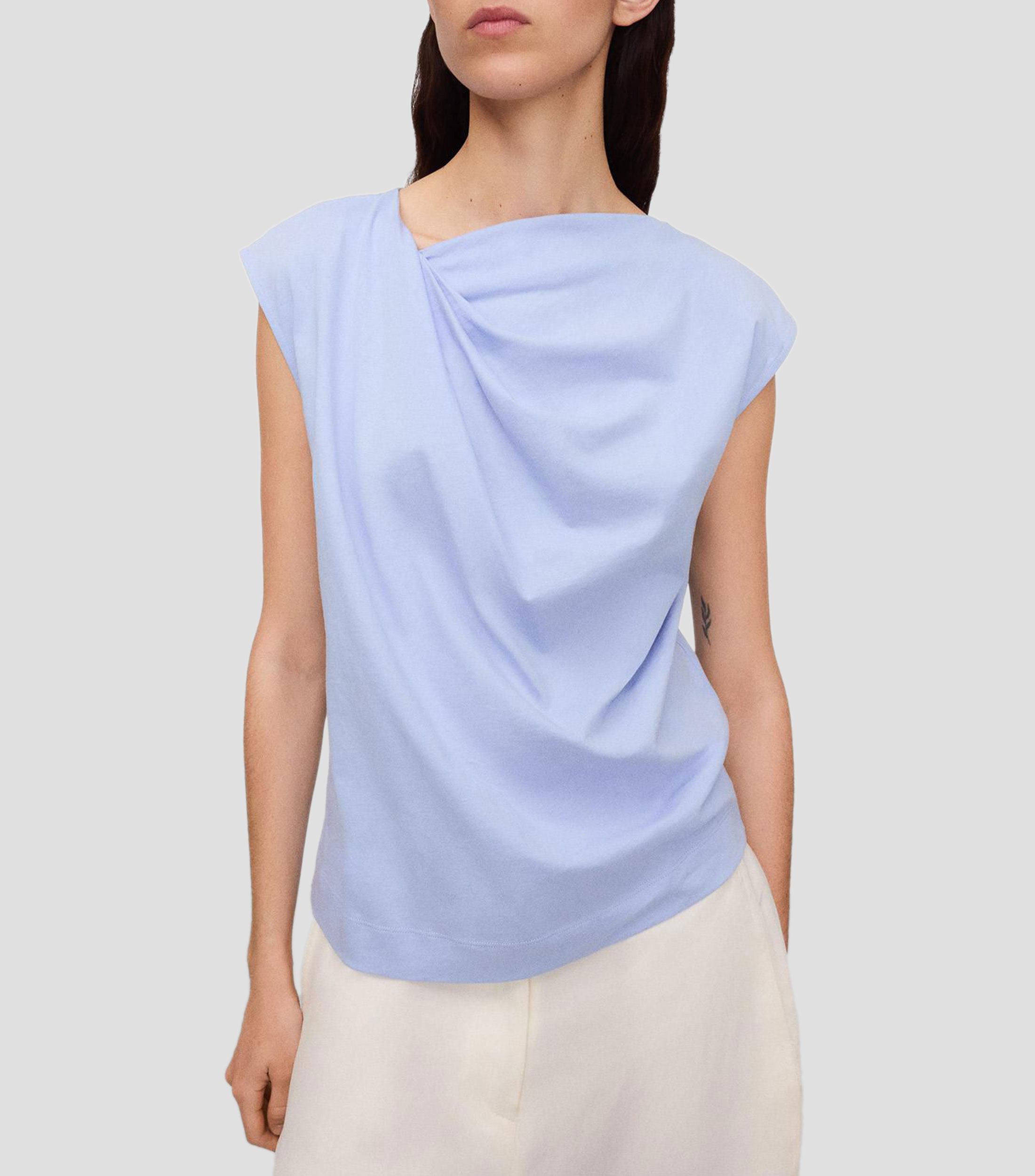 Blusa lisa sin mangas Mujer